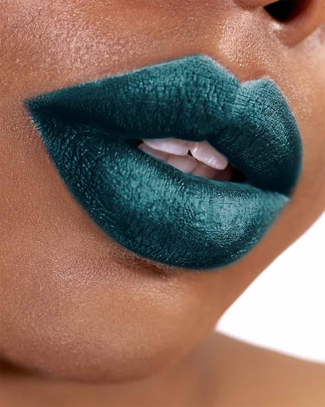 green lipstick on dark skin